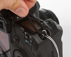pull the strap through the strap mount