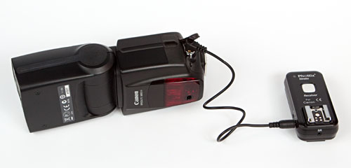 Strato receiver and Canon 580EX II flash connected via PC Sync cable