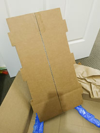 sturdy cardboard frame hiding the metal print