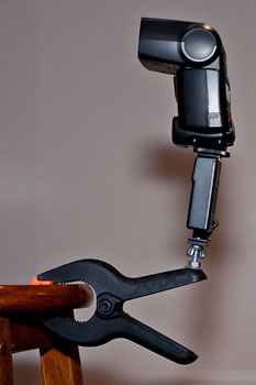 Canon 430EX mounted on a clamp