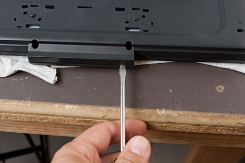 figure 4: lever the rear of the case