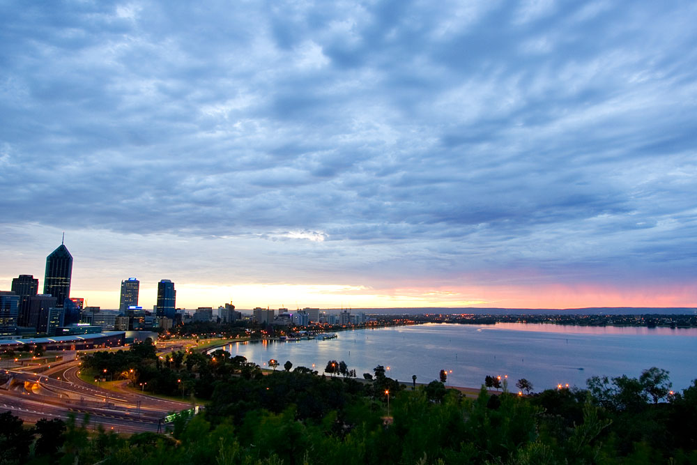 Perth city lights and Swan River at dawn