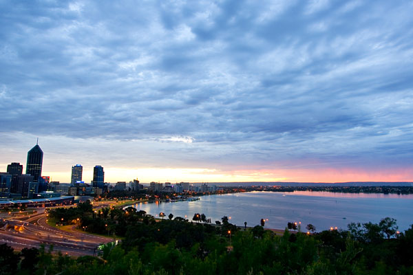 Perth city lights and Swan River at dawn