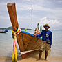 long-tail boat and driver