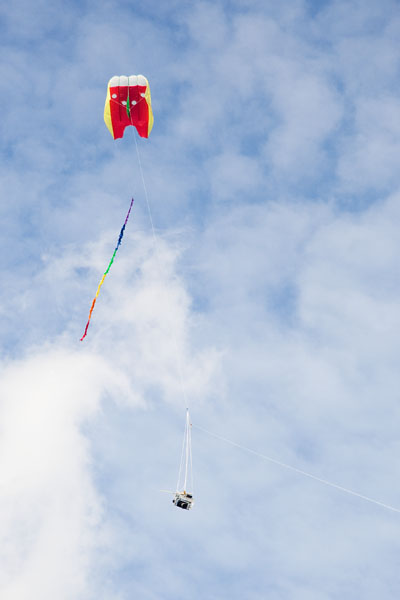 camera rig hanging from kite line