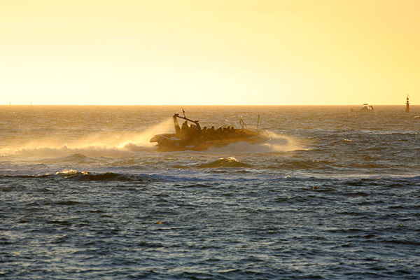 jet boat at sunset