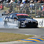 Jack Perkins locking up a front wheel in his Jack Daniel's Racing VE Commodore