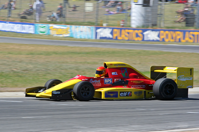 Formula 3000 car sprinting around the track