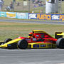 Formula 3000 car sprinting around the track