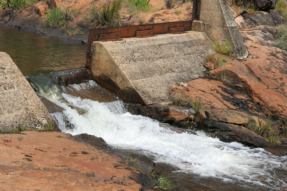 waterfall between the upper and lower pools