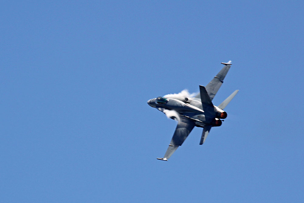 RAAF F/A18 Hornet and vapour on the leading edges