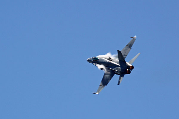 RAAF F/A18 Hornet and vapour on the leading edges