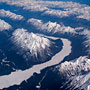frozen river and snowy Rockies