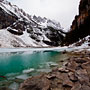 the emerald-green colour of the lake water
