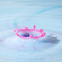 red water dropping into blue milk