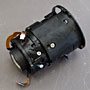 the outer barrel contains the focus mechanism, and the inner barrel contains the aperture diaphragm and the IS mechanism