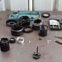 disassembled, with the aperture diaphragm assembly in the foreground