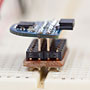 completed <a href="../electronics/msp430/breadboard.cgi">breadboard adapter</a> plugged into a breadboard