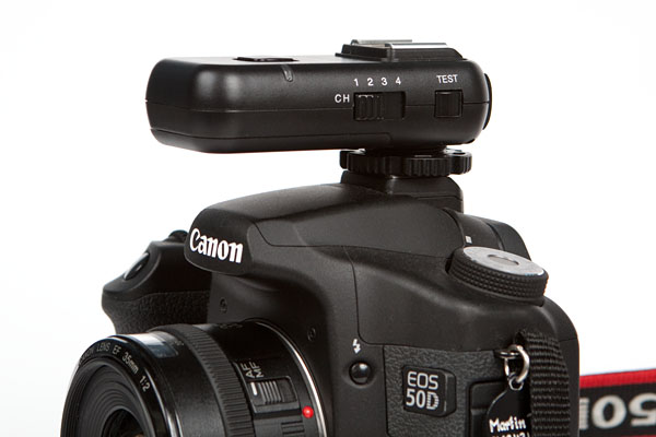 transmitter on the hot-shoe of a Canon 50D