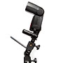 Canon 580EX II flash on a transmitter on a light stand