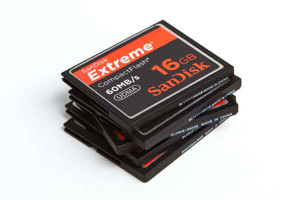 a pile of compact flash memory cards