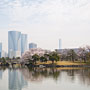 one of the lakes, with a backdrop of city buildings
