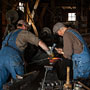 blacksmith and striker working together