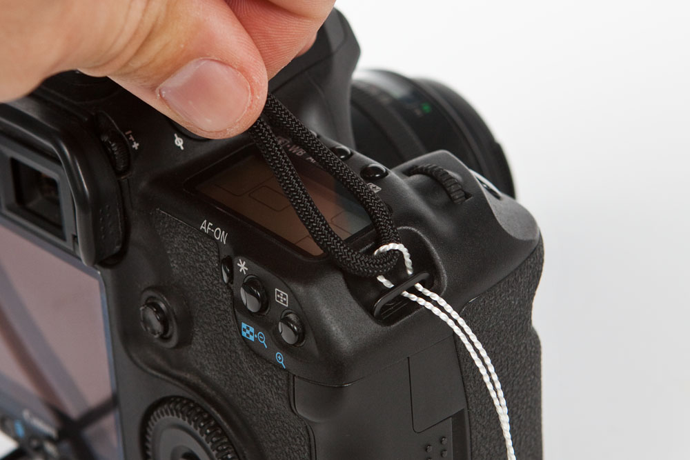 pull the strap through the strap mount