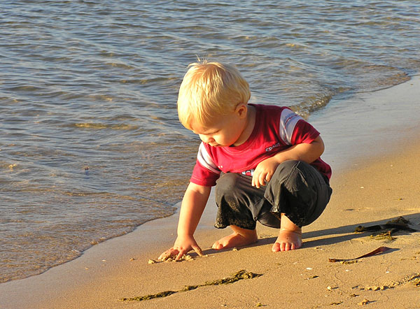 Nicholas enjoying the beach sand