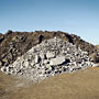 low-grade ore (light) and higher-grade ore (darker at rear)