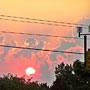 Angry sunset behind power lines