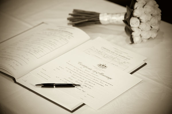 wedding certificate and bouquet